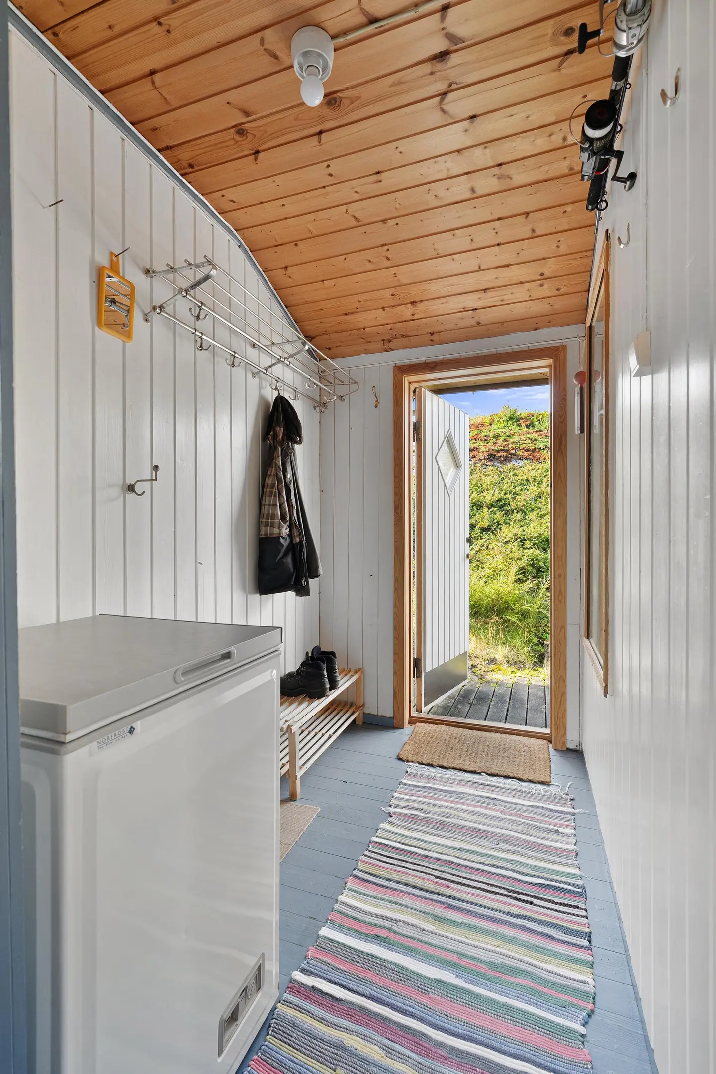 Entré med plass til oppbevaring av yttertøy og sko.